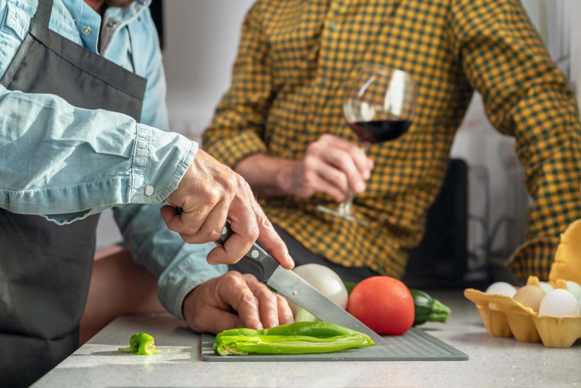 Workshop instructor demonstrating knife skills